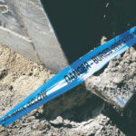a blue underground warning tape